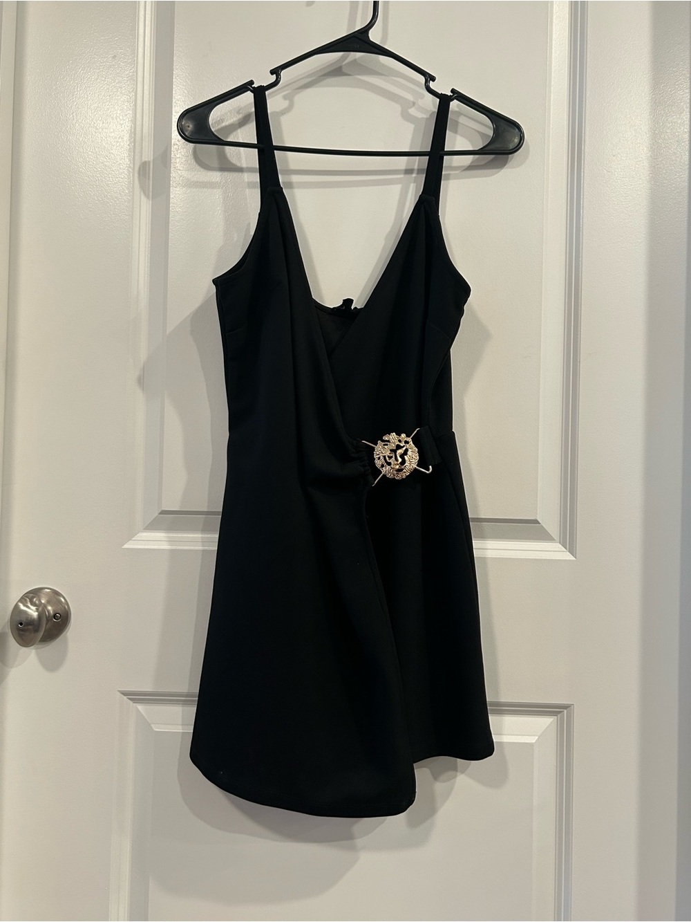 Have Black Sleeveless Wrap Romper with Decorative Brooch